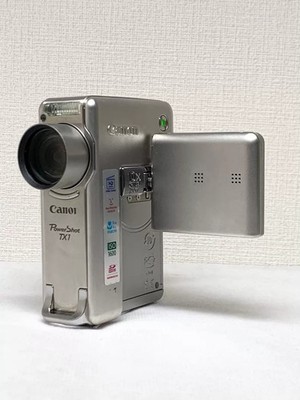 Canon PowerShot TX1 Digital Camera 7.1 MP 10x Optical Zoom Image Stabilization