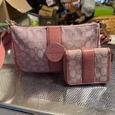 Coach Lonnie Baguette in the signature jacquard fabric with pink leather trim &