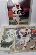 Cleveland Browns Autographed Pictures (Ozzie Newsome, Kevin Mack, Eddie Johnson)