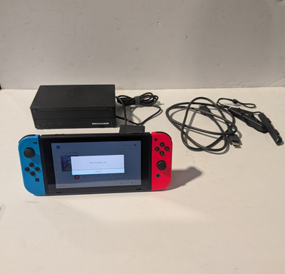 Nintendo SwitchGray Console Neon Red and Neon Blue Joy-Con with Dock