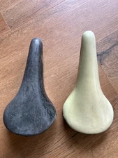 2 Vintage Selle San Marco Rolls Saddles - one  black and one white