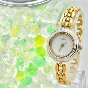 Montre à quartz pour femme GUCCI 11/12,2 lunette à changement dorée lunette blanche utilisée uniquement Japon