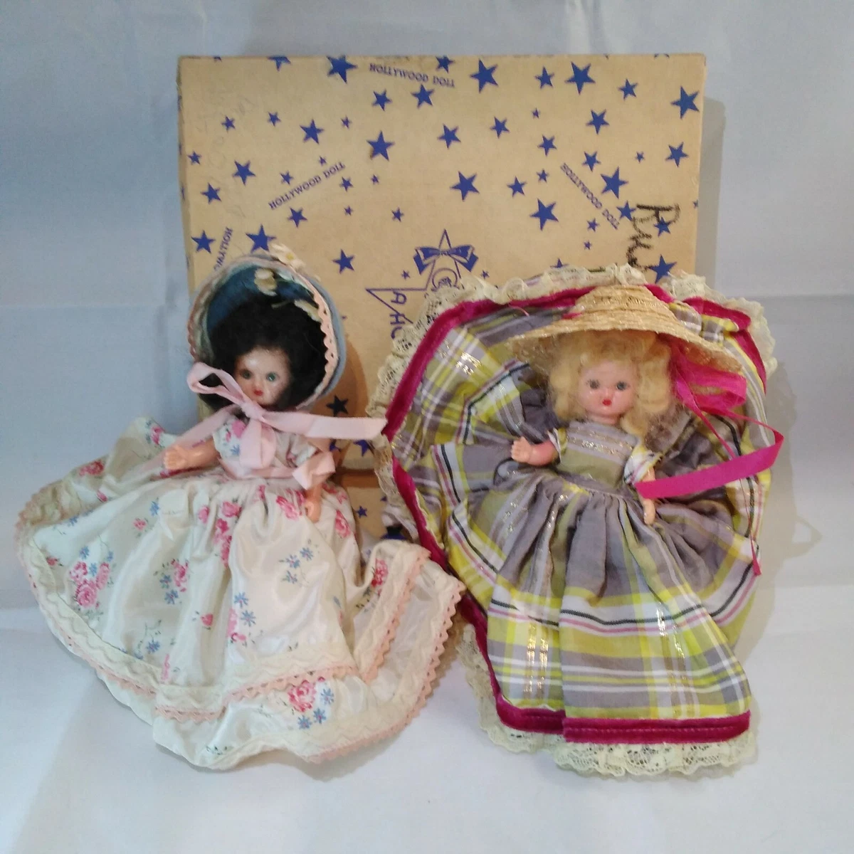 2 cheap little dolls