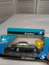 Solido 1:43 scale model of a 1978 Peugeot 504 Coupé.