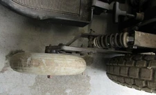 Primo stability wheel for quantum 1650 Wheelchair Tire with bracket & shock LEFT