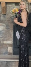 black floor-length prom gown with a fitted sheath/silhouette (xs)