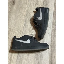 Nike Air Force 1 LE in black with a silver or reflective swoosh size 5