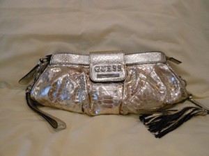 guess gold clutch bag
