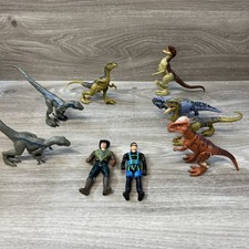 jurassic world Lot- 2 Figures And 7 Dinosaurs