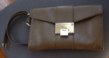 Jimmy Choo Rivera Wristlet Clutch pebbled, logo, removable / adjustable strap