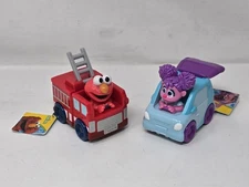 Sesame Street Twist & Pop Wheelies 2-Pack Toy Vehicles by Just Play, Abby & Elmo