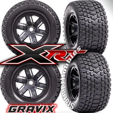 4 Traxxas XRT Gravix Tires & wheels, assembled, glued 7.4" tall 4" wide TRA7877