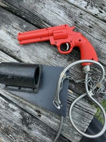 Vintage Nintendo Playchoice 10 Arcade Game Gun Revolver  Orange W/ Chain