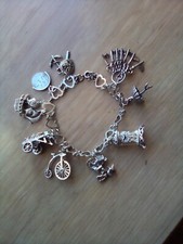 vintage 1970s sterling silver charm bracelet