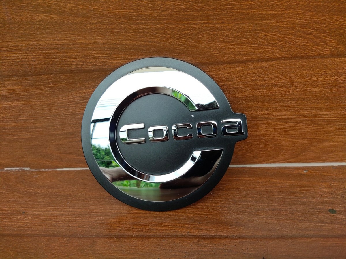 Daihatsu Mira Cocoa (L675) Front EMBLEM BADGE LOGO GENUINE P/N