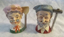 Pair~Vintage Creamer Figural Pitcher Old Man w/Hammer~Woman w/Broom Handles
