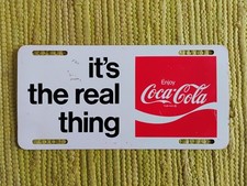 Vintage Coca Cola it's the real thing License Plate Soda Sign COKE 1969 Slogan