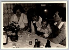 Vtg B&W Snapshot Three Women And Baby At Table With Flowers And Drinks 1974