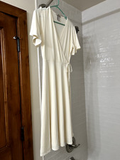 H&M dress size small off white, short sleeve faux wrap with a tie