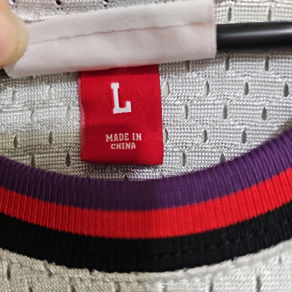 Camiseta deportiva Mitchell & Ness Swingman 1998-99 Tracy McGrady #1 Raptors para hombre platino Foto 4 de 4