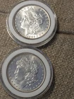 Two (2) BU Morgan Silver Dollars, 1886 & 1904-O