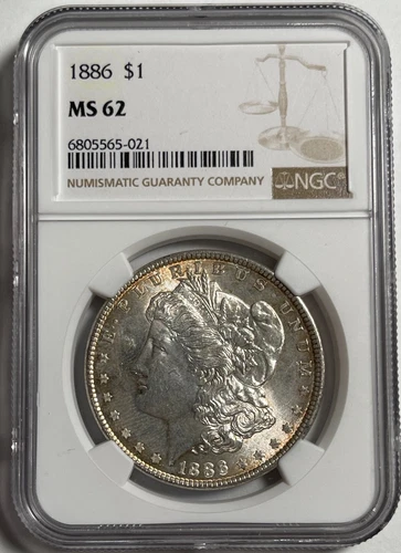 1886 Morgan dollar (#16892) NGC MS62 White tinge of gold.  Fresh holder.
