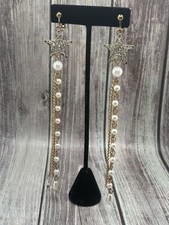 Rhinestone Star Clip On Earrings With Chain In gold