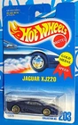 Hot Wheels Mid 1990s Mainline #203 Jaguar XJ220 Mtflk Dark Blue w/ WSPs Gray Int