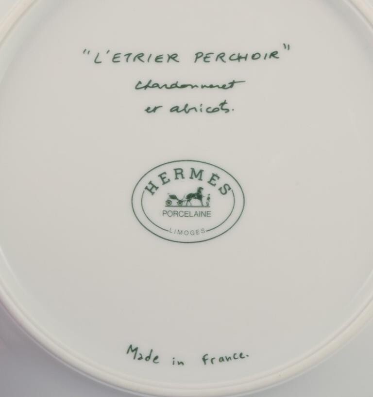 Hermès France. 'L'Étrier Perchoir' series. Two porcelain plates