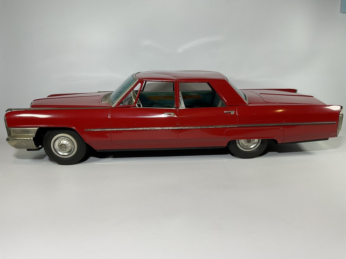 Cadillac De Ville Tin Friction Toy 1965 Vintage 26” Nomura Cadillac De Ville Tin Friction Toy 1965 Vintage 26” Nomura
