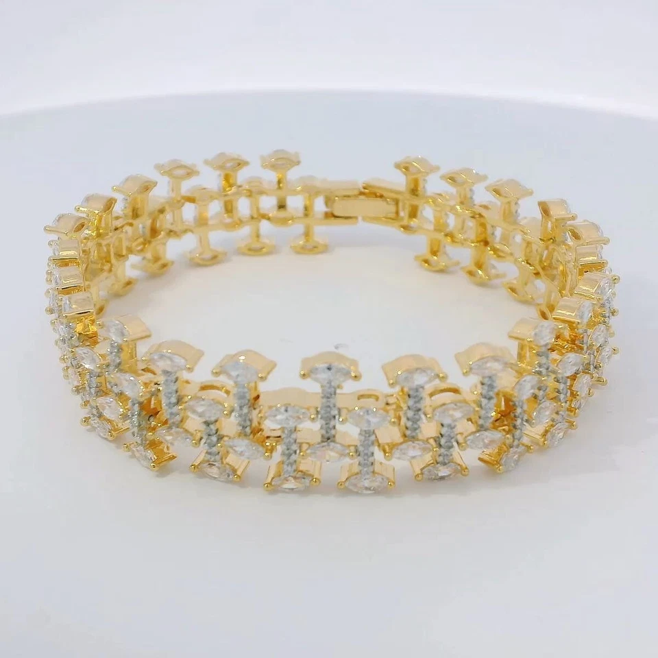 Pulsera chapada en oro con tachuelas de circonita cúbica bellamente diseñada FB-1128 Foto 2 de 4