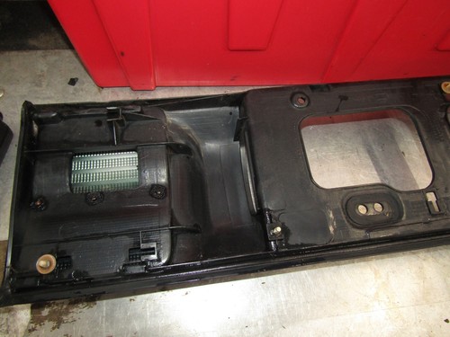 1988-1992 Toyota Corolla sedan OEM trunk trim license plate garnish (broken tab) - Picture 5 of 7