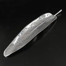 Aluminum 22.25" long footed leaf tray w/stem, croc design on back