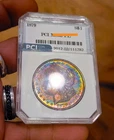 1879 P  MORGAN SILVER DOLLAR  VIBRAINT RAINBOW TONING PCI SLAB.