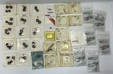 LARGE LOT - AFX - AURORA ETC - PARTS - PICKUP SHOES - SPACERS ALL N.I.B. (T234)