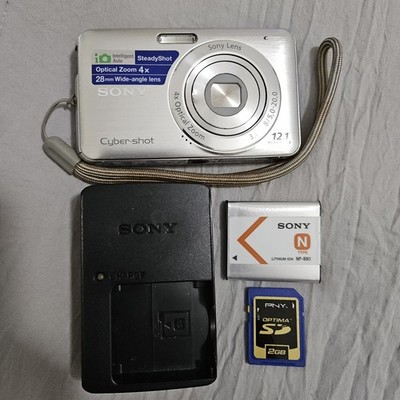 Sony CyberShot DSC-W310 12.1MP Digital Camera Battery 2GB SD Tested Dented Bezel