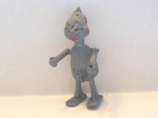 vintage metal robot figure . Manual walking. 2-1/2" tall. Very Unusual 