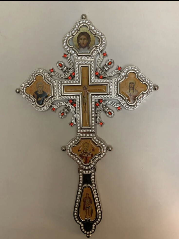Orthodox Christian Prist blessing big cross