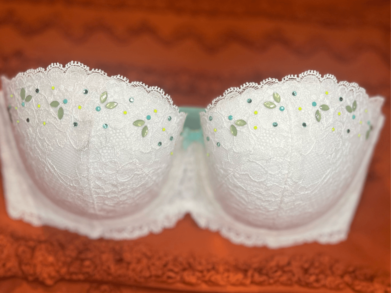 Victoria's Secret strapless lacy beaded bra 32DD.