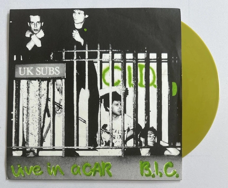 UK Subs - C.I.D ~ 7” Yellow / Olive Vinyl Record Punk EX / EX  RARE - Image 2 of 4
