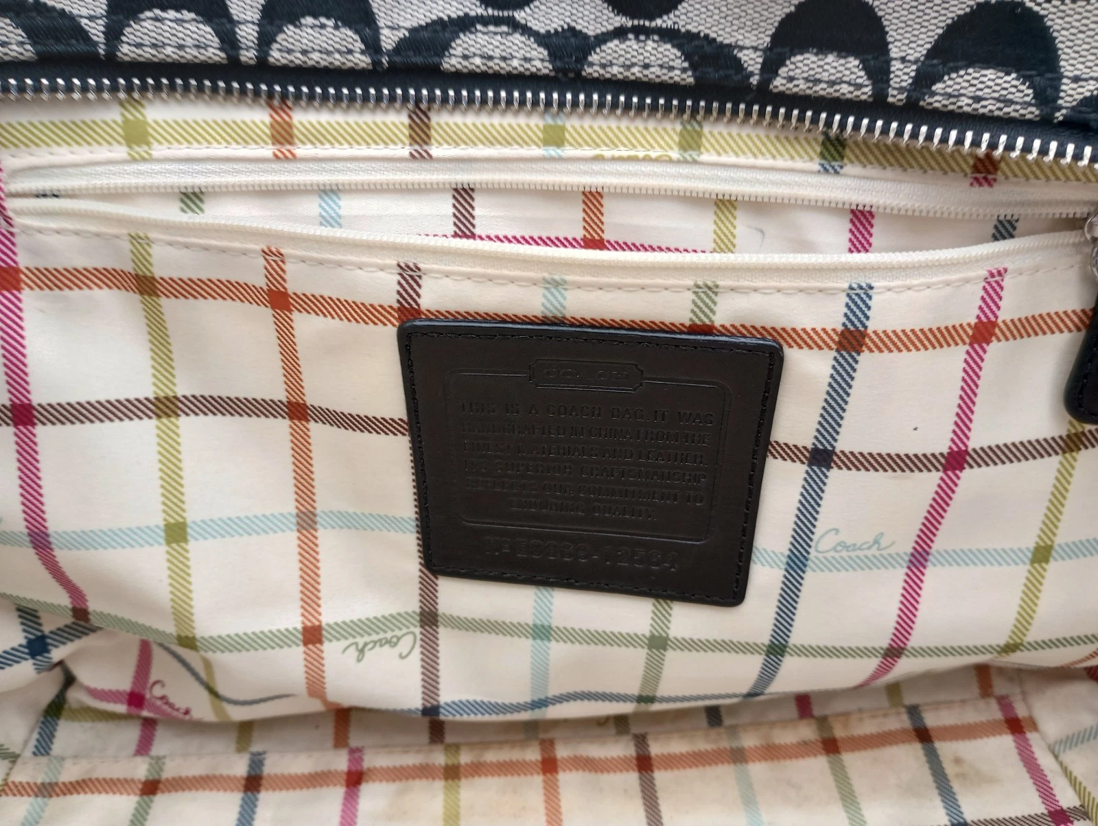 Borsa a tracolla Coach Bleecker Signature nera tela bordo pelle manico superiore