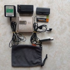Mint condition, rare vintage SONY MD Walkman MZ-R55 with 8 bonus items included.