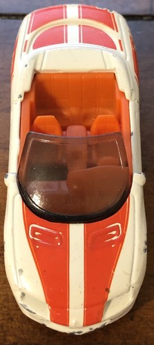 Chevy Camaro 1995 convertible blanco naranja rayas sueltas Hot Wheels - Imagen 3 de 5