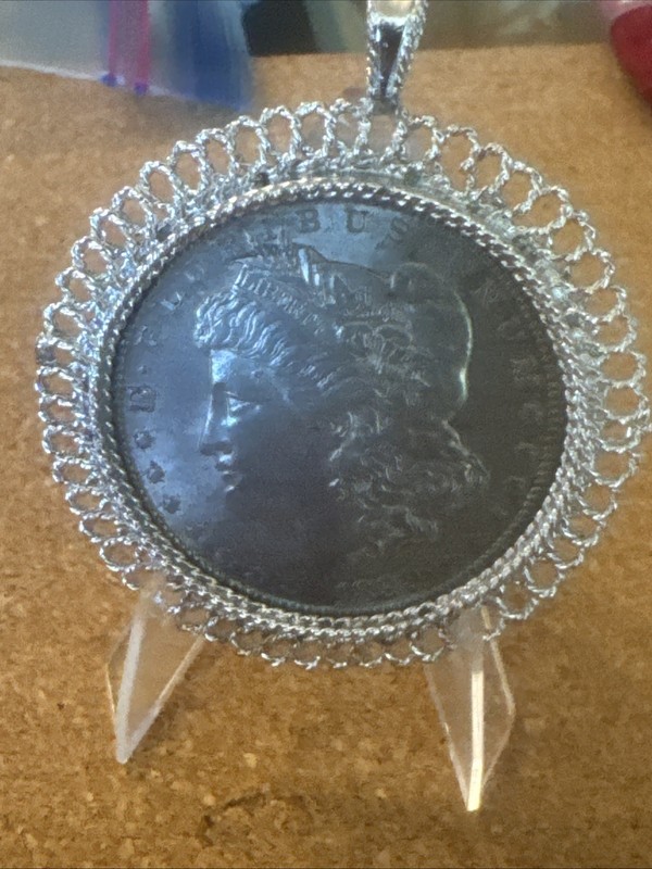 1899-O Morgan Silver Dollar Framed in nice chain