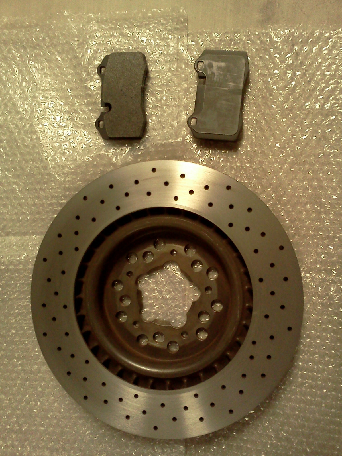 This is for ( 1) FERRARI F430 360 FRONT BRAKE 13" ROTOR And Pad's is Oem Part.