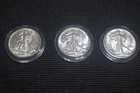 ( 3 ) UNCIRCULATED 90% SILVER WALKING LIBERTY HALF DOLLARS 1942 , 1943 , 1943 S