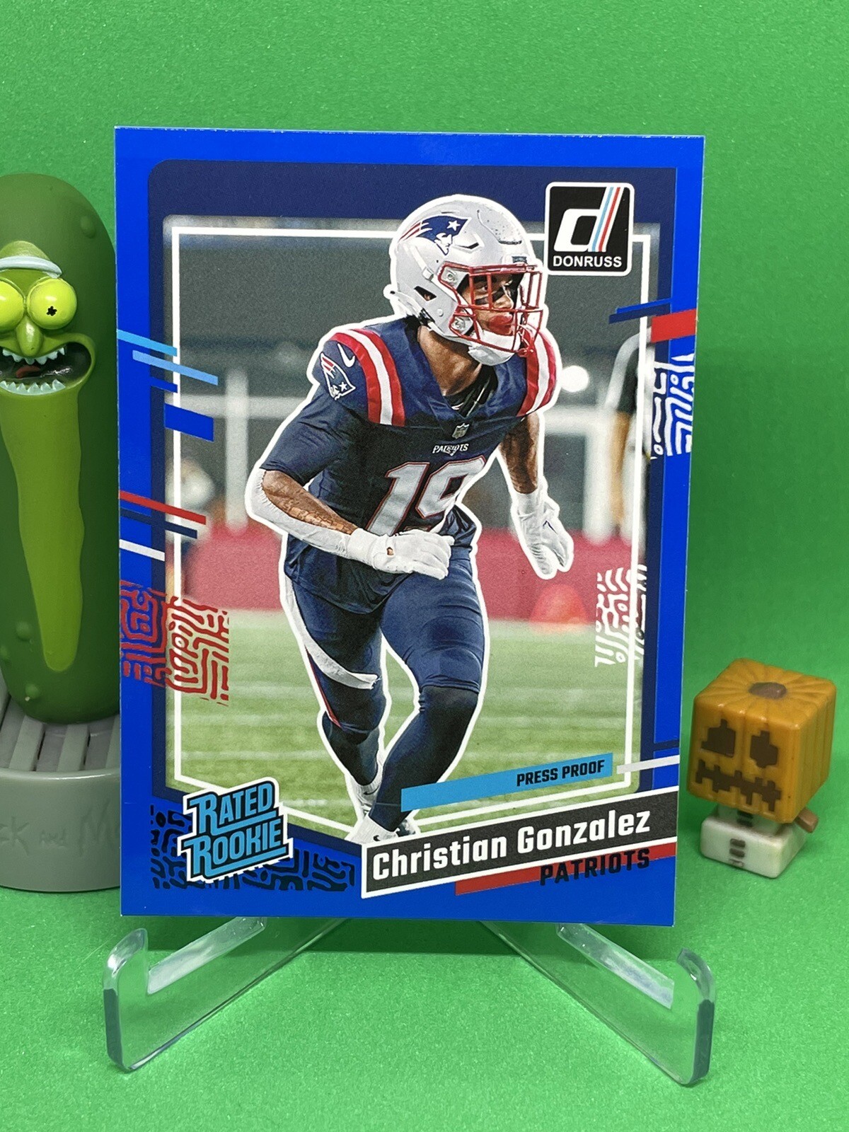 2023 Donruss #369 Christian Gonzalez Rated Rookie Blue Press Proof Patriots
