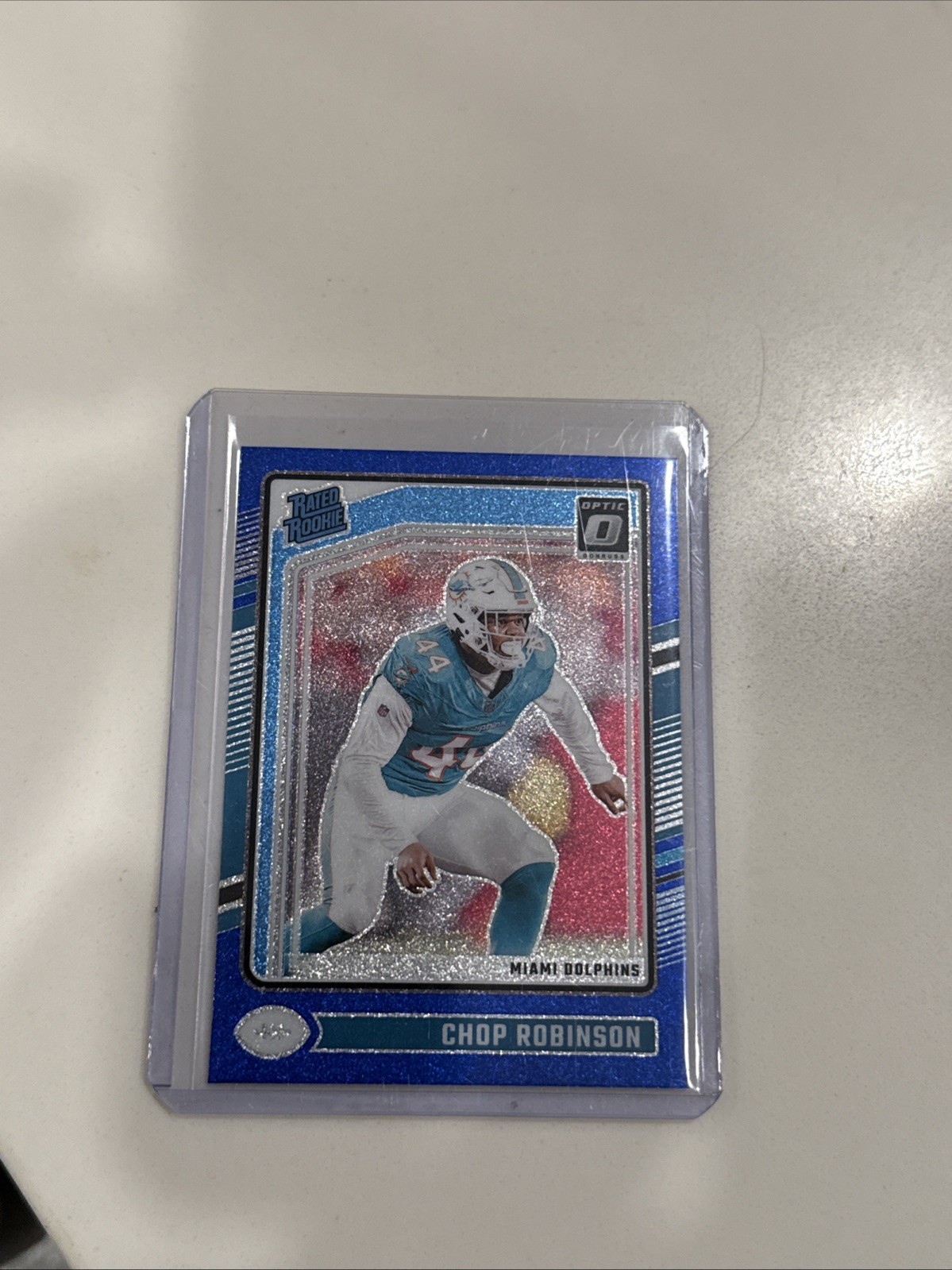 2024 Panini Donruss Optic - Rated Rookie Chop Robinson #219 Blue Glitter Prizm