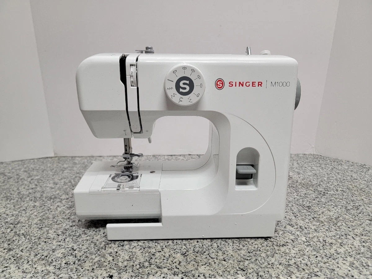 Singer M1000 Sewing Machine With 32 Stitch Applications And