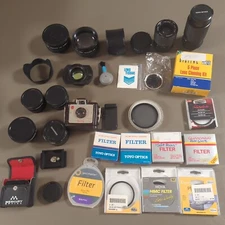 Large Lot Of Many Camera Lens, Filters, And Other Camera Accessories